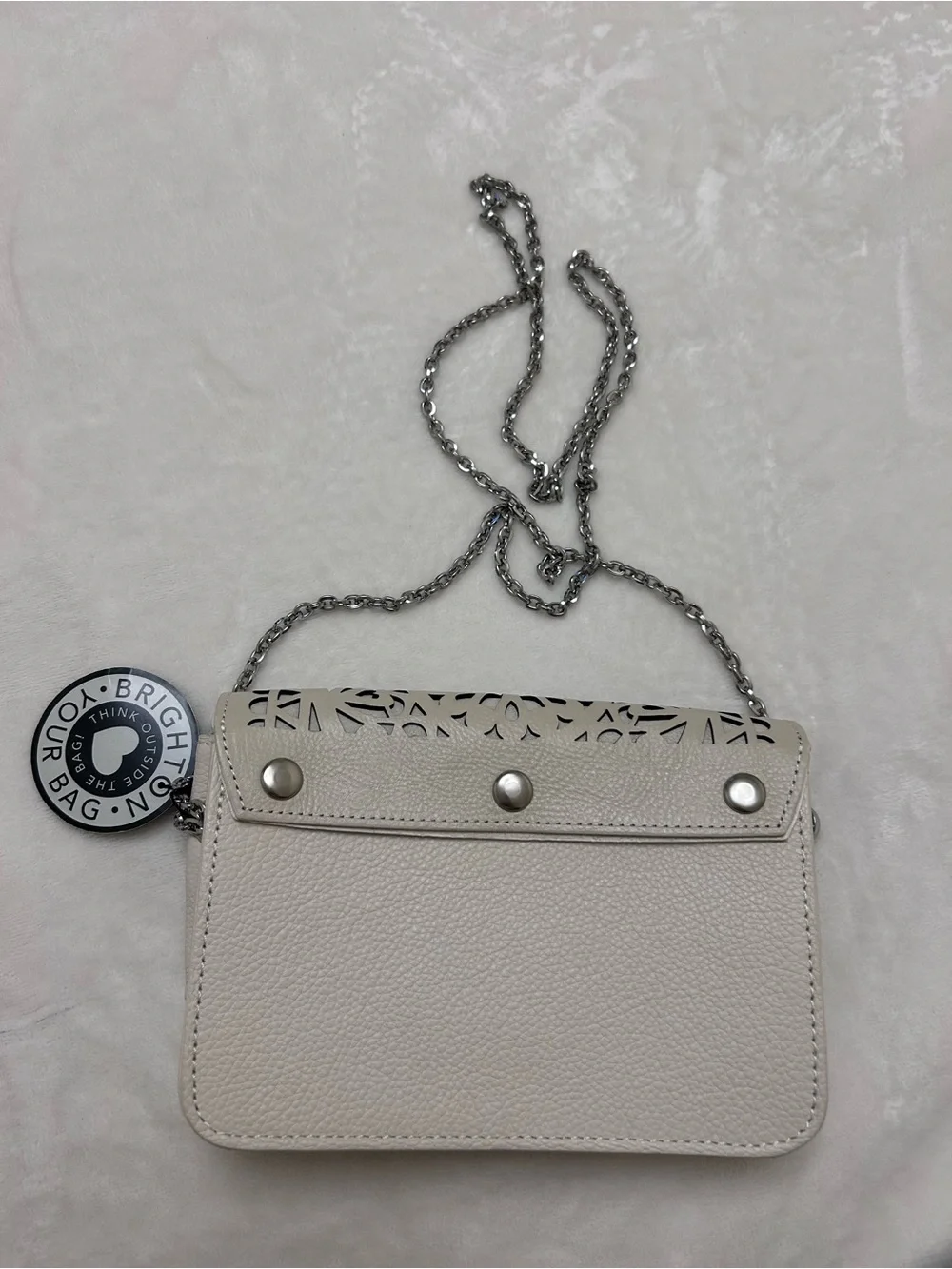 Brighton Cream Laser-Cut Crossbody with Silver Chain